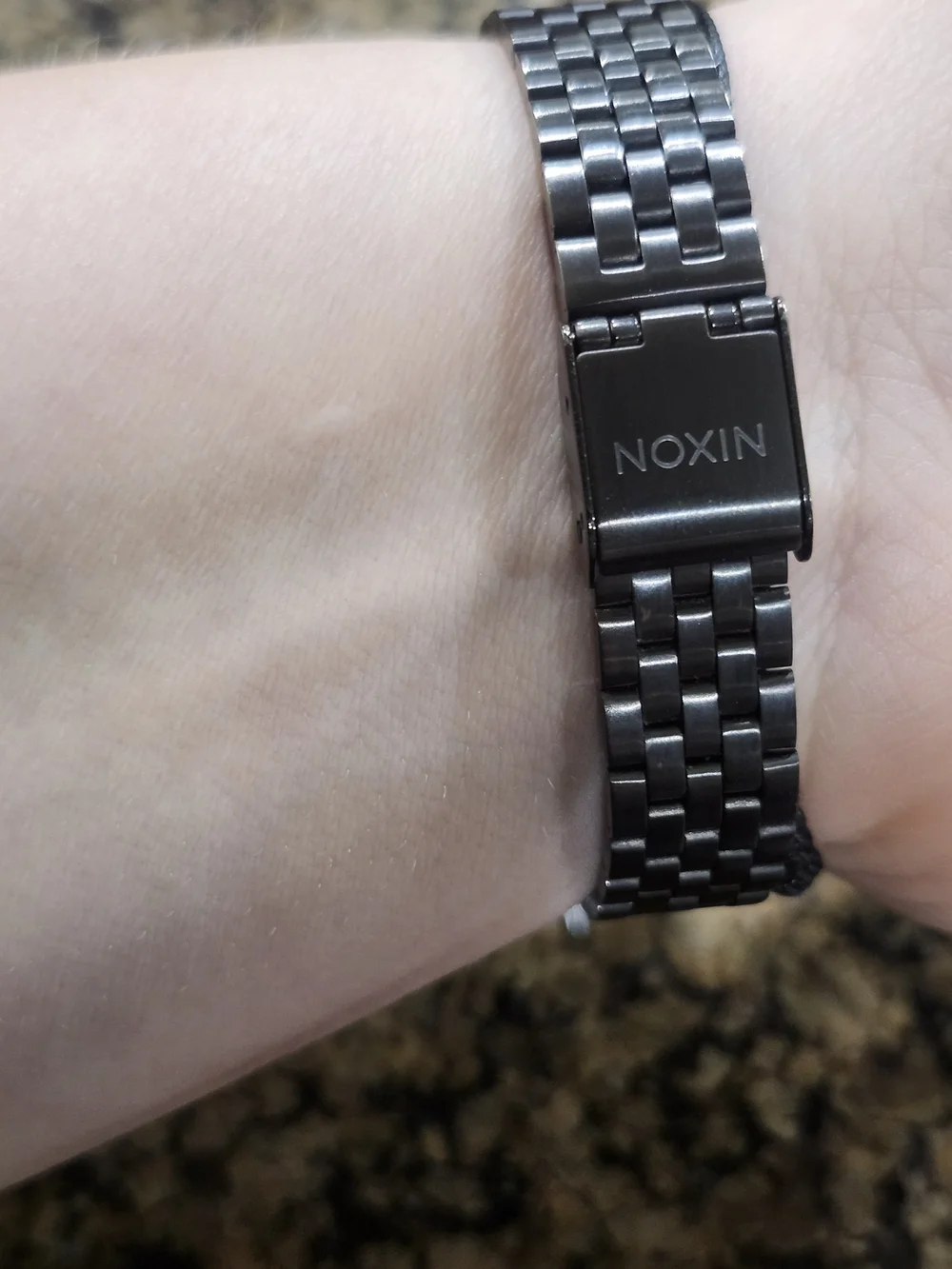 Nixon modern wristwatch
